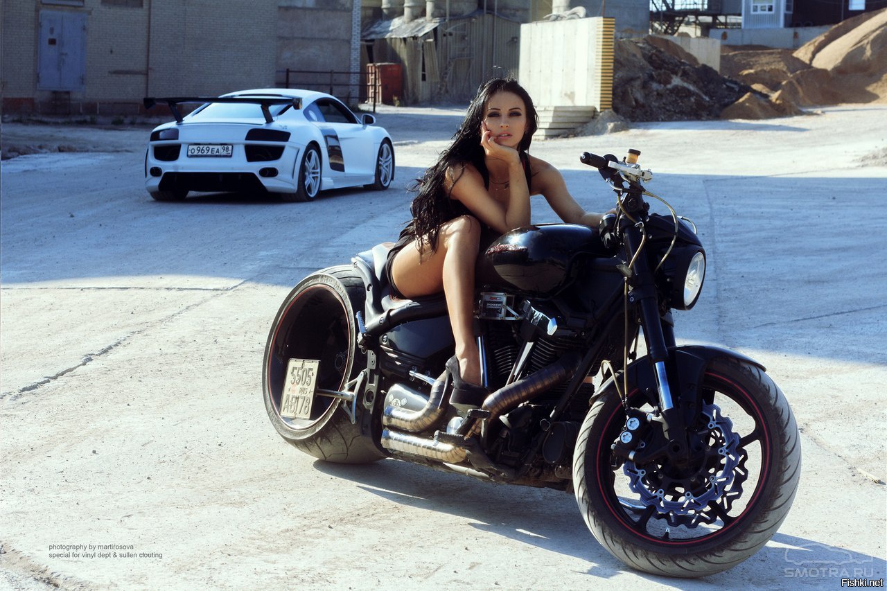 Sexy model Brunettes on a motorcycle in Dubai